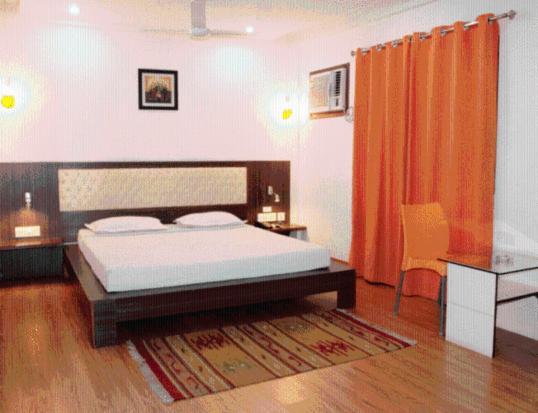Hotel Crestwood Calcutá Quarto foto